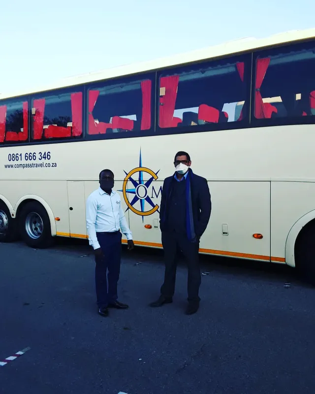 Compass Travel branded vehicles at a Cape Town venue