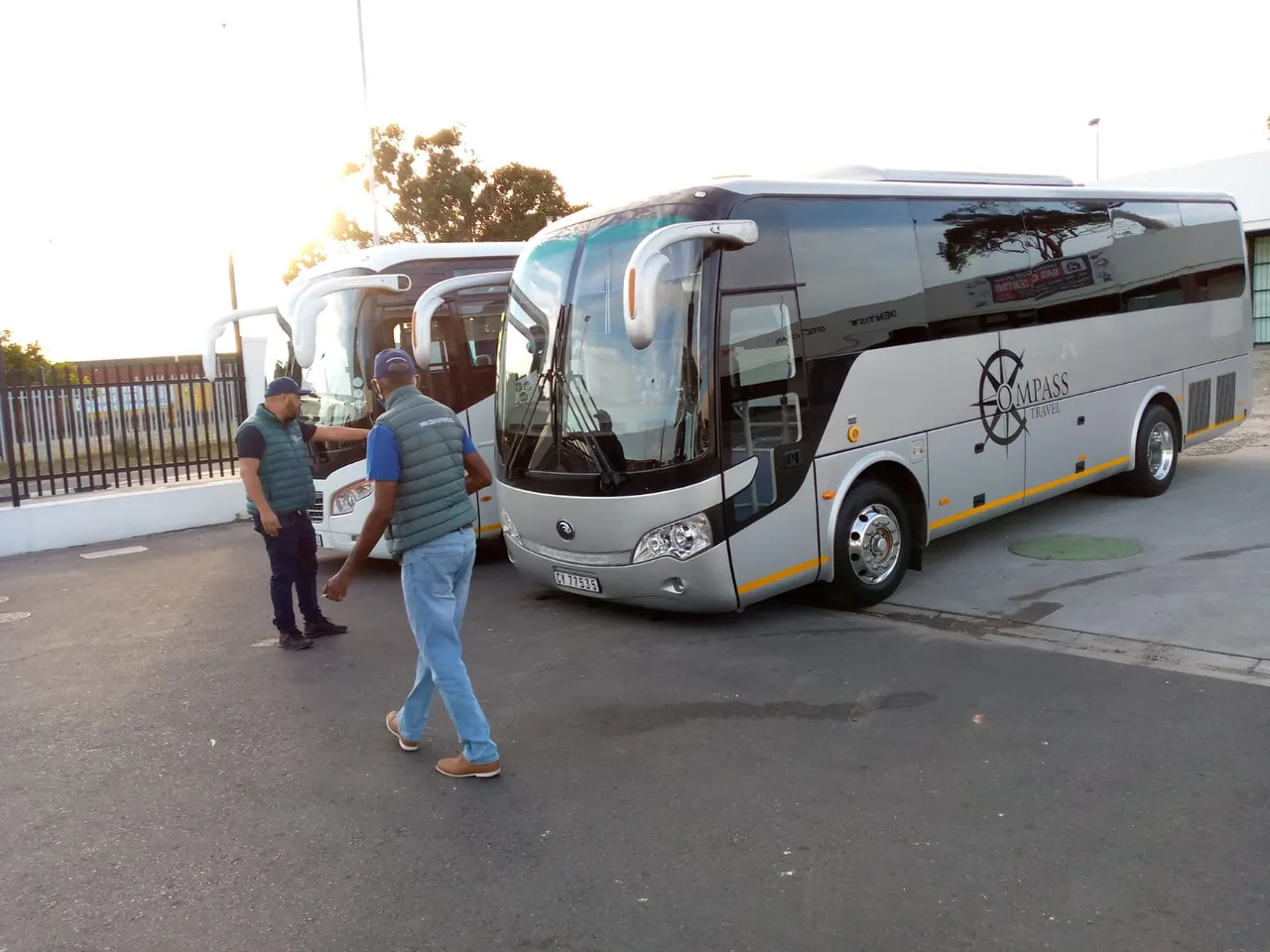 Compass Travel branded vehicles at a Cape Town venue