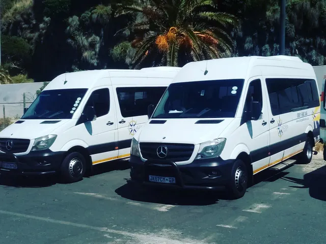 Compass Travel branded vehicles at a Cape Town venue