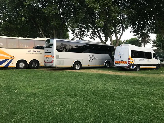 Compass Travel branded vehicles at a Cape Town venue