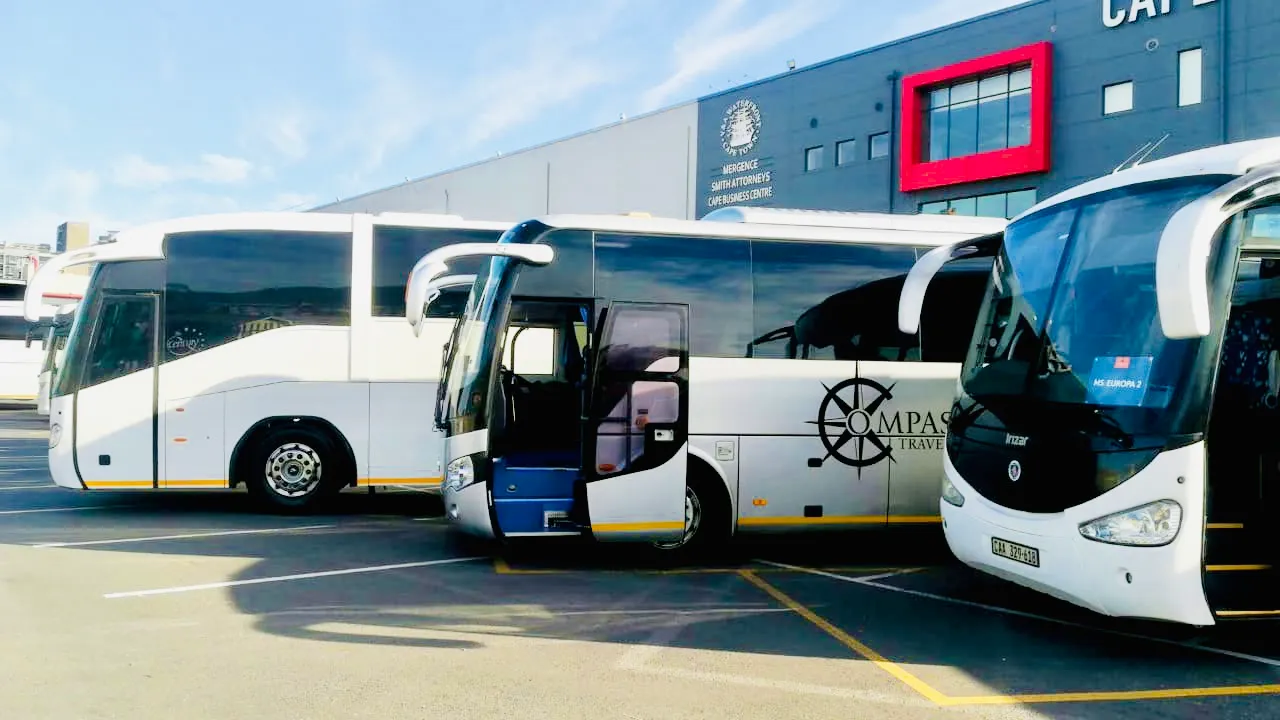 Compass Travel branded vehicles at a Cape Town venue