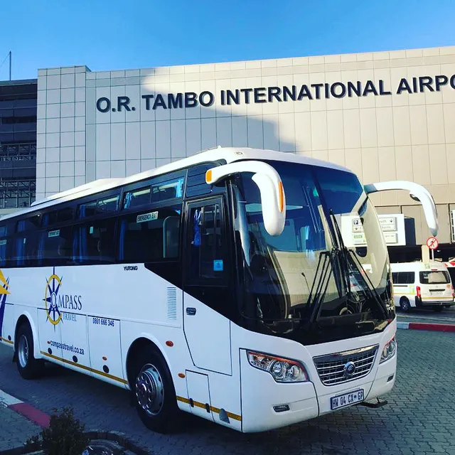 Compass Travel branded vehicles at a Cape Town venue