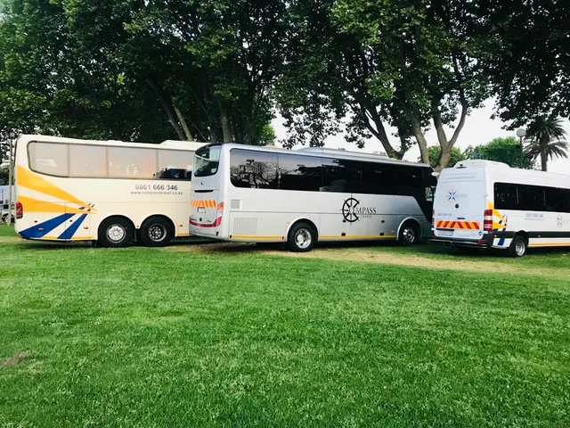Compass Travel branded vehicles at a Cape Town venue